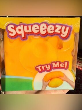 NEW Squeeezy Cheese orange stress cube and fidget!